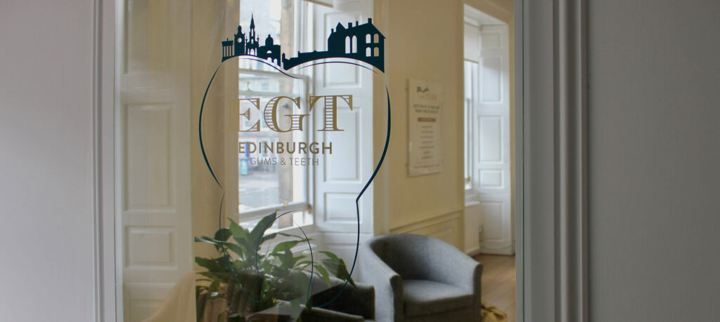 edinburgh gums and teeth office in a mirror