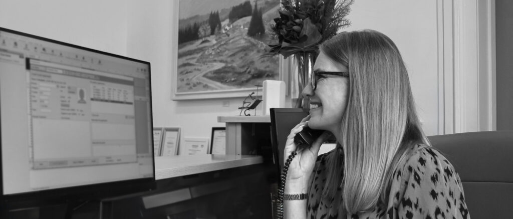 receptionist taking a call