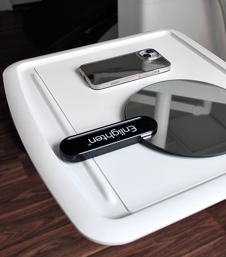 dental mirror and phone on table