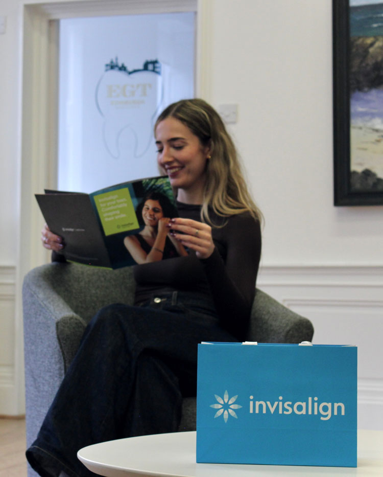 female patient reading a brochure